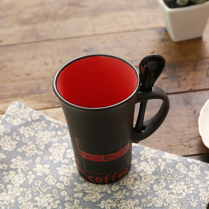 simple ceramic coffee mug with spoon