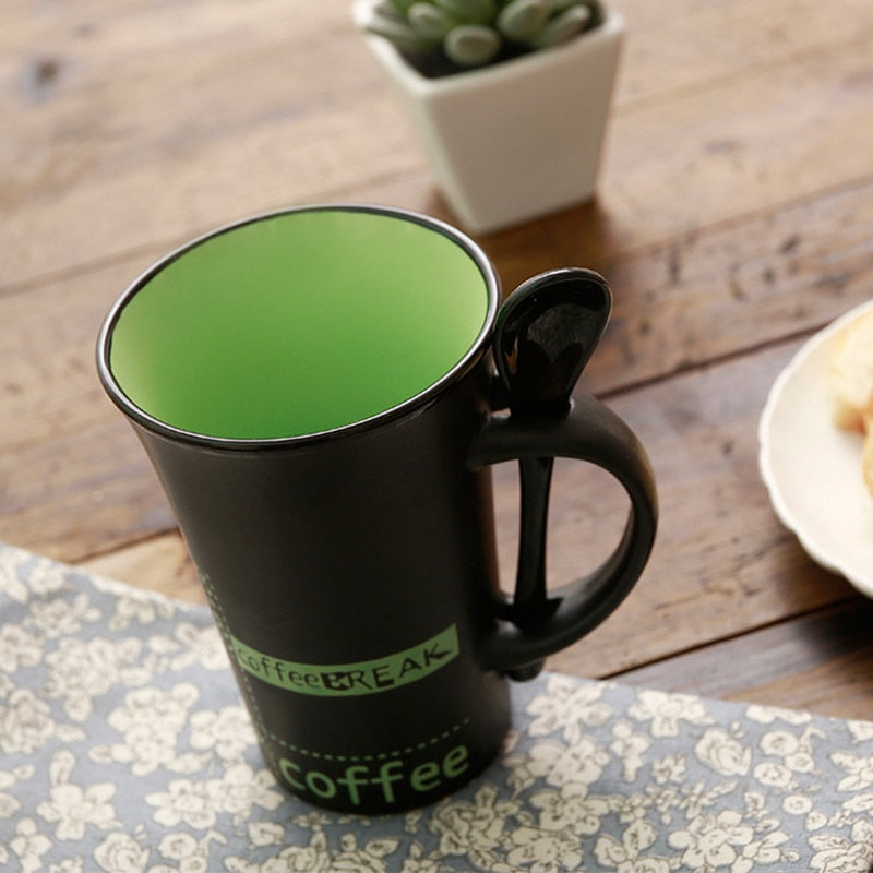 simple ceramic coffee mug with spoon