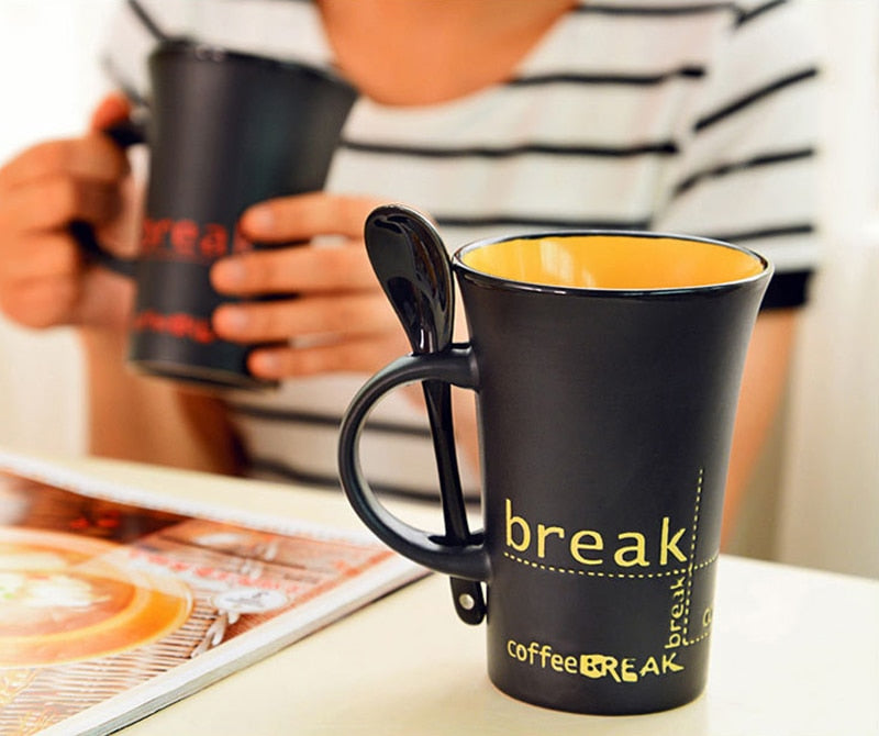simple ceramic coffee mug with spoon