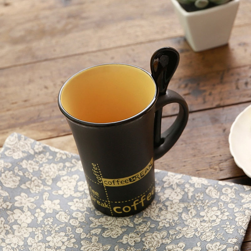 simple ceramic coffee mug with spoon