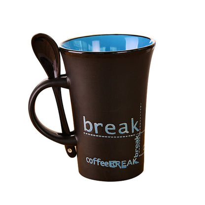 simple ceramic coffee mug with spoon